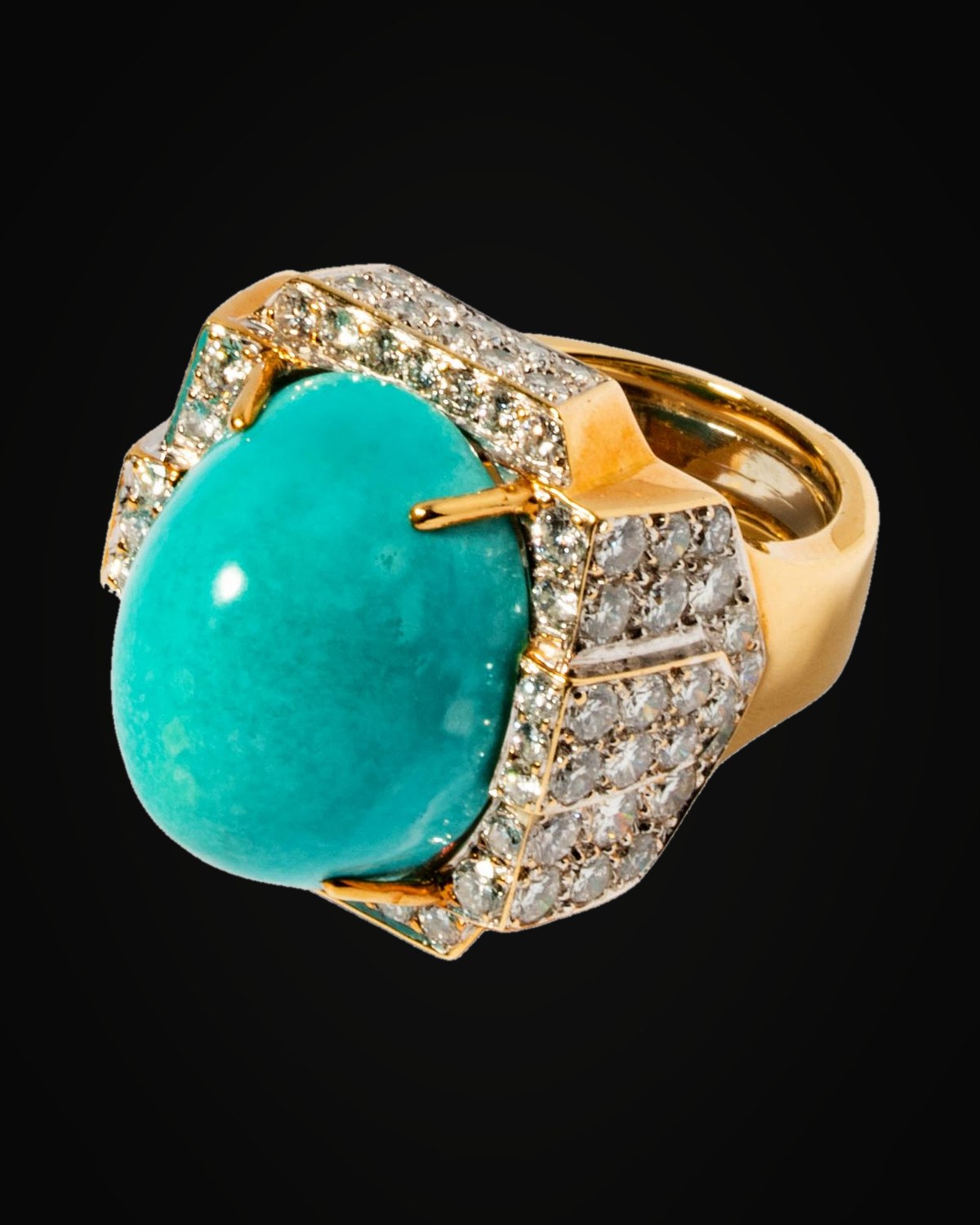 David Webb — an eighteen karat yellow gold, platinum, diamond and turquoise ring, on black